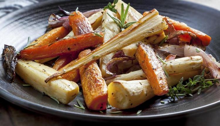A plate of roasted carrots and parsnips 
